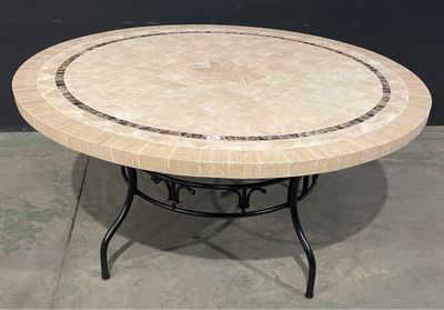 a round table with a marble top and a black base