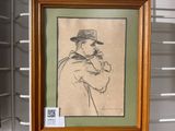tableau représentant un homme portant un chapeau et tenant une cigarette, dans un cadre en bois