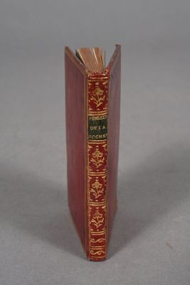a red book that is sitting on a table