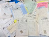 a pile of old papers sitting on top of a table