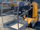 a close up of a forklift parked in a parking lot