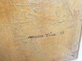 a close up of a painting with writing on it