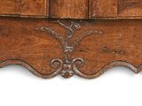 a close up view of a wooden dresser with a drawer