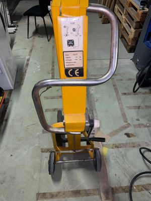 a yellow machine that is sitting on the floor