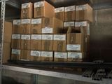 shelves with boxes and boxes of food on them in a room