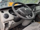 a car with a steering wheel and a dashboard