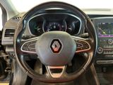 the interior of a car with a steering wheel and dashboard controls