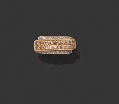 an 18k gold and diamond band ring