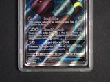 a close up of a pokemon card on a table