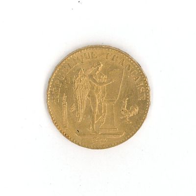 une image représentant une pièce d'or surmontée d'une statue
