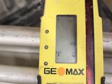 a close up of a yellow and black device on a bike