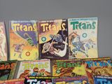 a lot of comic books on the table