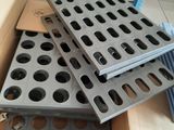 a box with a bunch of holes in it
