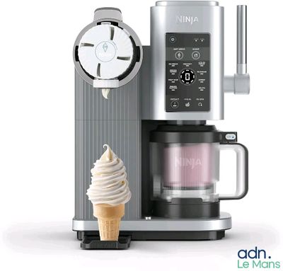 an ice cream cone sitting next to a coffee maker