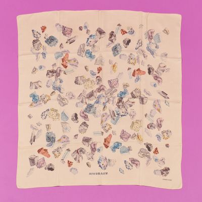 a close up of a square scarf with butterflies on it
