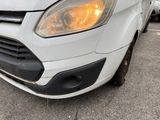 a white van that is parked in a parking lot
