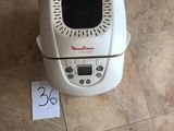 a small air fryer on the floor with a price tag on it