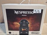 a box that has a coffee machine inside of it