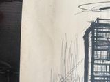 a drawing of a building under construction on a piece of paper