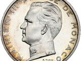 une image montrant un gros plan d'une pièce de monnaie sur laquelle figure le visage d'un homme