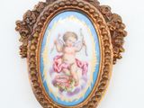 a picture of a picture of a cupid holding a bow