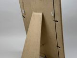 an image of a picture frame made out of cardboard on a white background