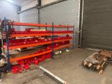 warehouse shelvings with red bins and shelves in a warehouse