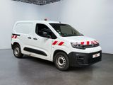 citroen van with red and white stripes parked in a white room