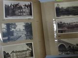 an open book with pictures of buildings on it