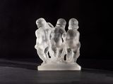 an image of a glass sculpture of a group of people