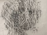 a black and white photo of a drawing on a piece of paper