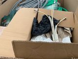 a cardboard box with a bunch of items inside of it