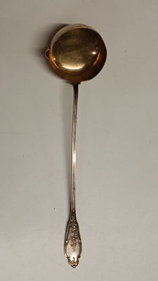 a spoon that is sitting on a table