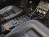 a car dashboard with a control panel in the center of it