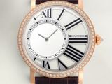 une image d'un gros plan d'une montre-bracelet avec des chiffres romains