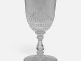 a glass that is sitting on a table