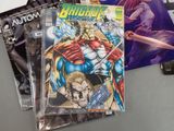 a lot of comic books sitting on a table