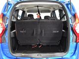 two seats in the back of a small blue car