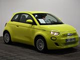 an image of a bright yellow smart car in a showroom