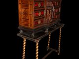 a small wooden table with a book case on top of it