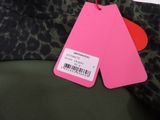 leopard print jacket with a pink tag attached to the back of it