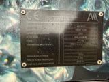 a plaque on the side of a building with information on it