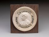 une photo d'une plaque sur laquelle figure le portrait d'une femme