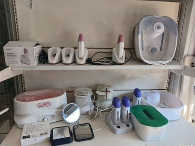 a shelf with a lot of items on top of it