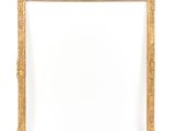 a gold picture frame on a white background