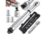 a hand holding a wrenet and a wrenet with tools in it