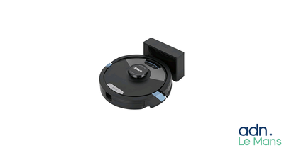 a black robot that is sitting on a white surface