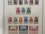 an old picture of a sheet of stamps with a picture of a woman