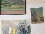 many paintings on the wall of this room
