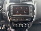 the dashboard of a car with a digital display on the dash